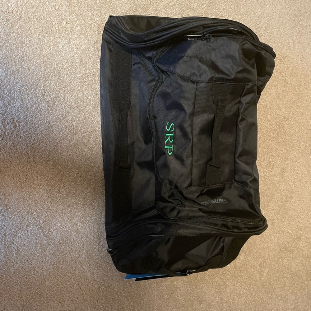 Suitcase rolling.